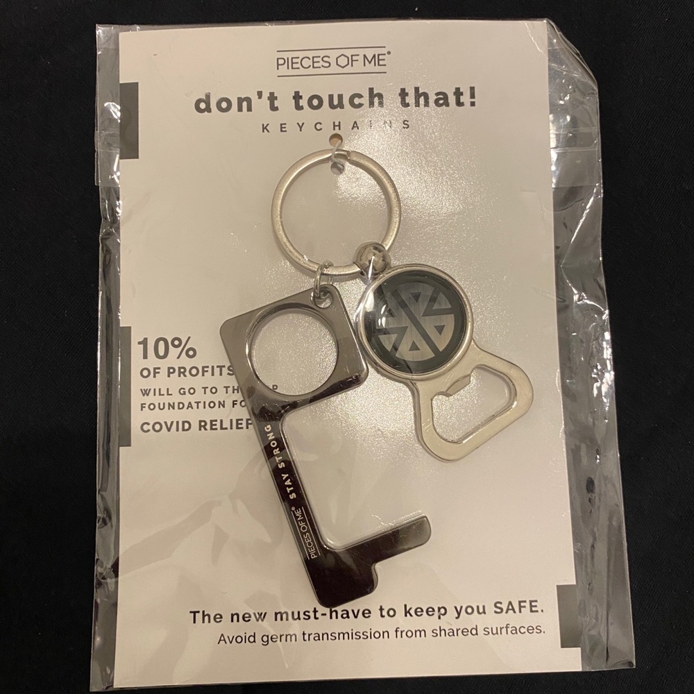 DON’T TOUCH THAT!! Keychain from Pieces of Me.  NWT still in sealed package.